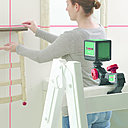 Step 3 Placez l'étagère contre le mur et vérifiez avec le niveau.