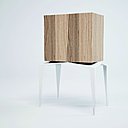 Le cabinet de la collection Médris, réalisé en association avec un fabricant italien et un ébéniste français. Structure en bois et piétement de métal.