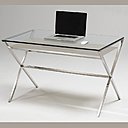 Elle se fera très discrète dans l’entrée. Une console au plateau en verre et pied inox. 920 €. Console XL 350. Marais International.