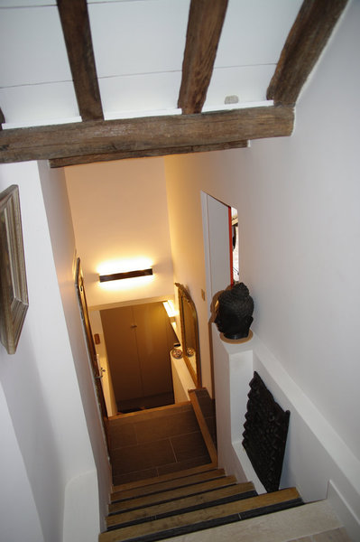 Cet appartement situé dans le 18ème arrondissement de Paris s’étend sur trois niveaux, chacun représentant un lieu de vie.