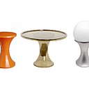 Créé en 1969 par Henri Massonet, le tabouret Tam Tam traverse le temps, et se décline au fil des ans. Du Tam Tam Pop disponible en noir, blanc, rouge, violet et orange, il passe à la table d’appoint Tam Tam, tout en transparence, pour évoluer en Lampe Tam Tam, sur un pied en résine. Mais jusqu’où ira-t-il ? Créé en 1969 par Henri Massonet, le tabouret Tam Tam traverse le temps, et se décline au fil des ans. Du Tam Tam Pop disponible en noir, blanc, rouge, violet et orange, il passe à la table d’appoint Tam Tam, tout en transparence, pour évoluer en Lampe Tam Tam, sur un pied en résine. Mais jusqu’où ira-t-il ?