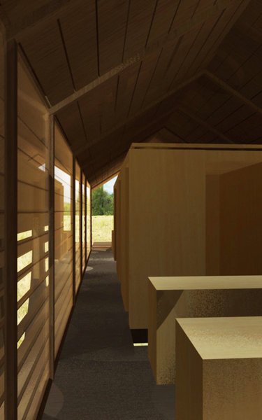 Le volume intérieur se compose de boîtes. La lumière arrive de tous les côtés. Deux coursives latérales longeant les façades assurent la circulation.