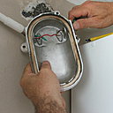 Etape 5 : Retirez les fils de connexion électrique (la phase et le neutre) du support métallique.