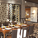 Dans la salle du restaurant L'Oxalys, une partie de la cave s'expose !!