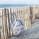Sac de plage et sable fin.