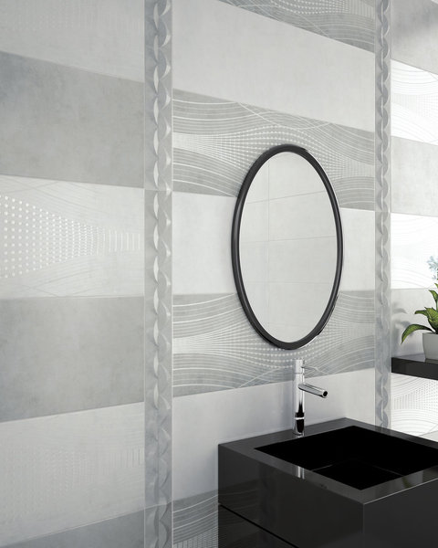 Berlin d’Azuliber propose une série de coloris sobres, avec des motifs graphiques, entre vagues et ellipses, qui donnent du mouvement au mur. (Berlin d’Azuliber)