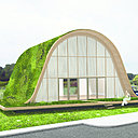 A Reims, Patrick Nadeau a imaginé la Maison Vague, une maison qui s’intègre à son environnement, et dont l’armature en bois est entièrement recouverte de végétaux. En choisissant une forme de vague, l’architecte a voulu traduire l’idée d’un mouvement de terrain vague, avec une végétation qui pousse de manière sauvage.