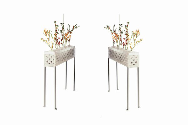 En 2002, Patrick Nadeau a imaginé pour Truffaut ce principe de cache-pots qui permet d’insérer des cartouches pré-plantées de terre et de graines.