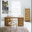 Fauteuil en teck massif et revêtement de chèvre. Fauteuil Lapon, Maisons du Monde.