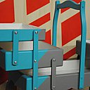 La travailleuse en biais, grise et turquoise.