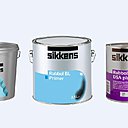 Les 3 produits Sikkens permettant de repeindre une façade de maison dans les règles de l'art.
