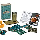 Recettes et accessoires de déco réunis dans un coffret pour dîner à Marrakech.