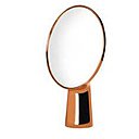 Mon beau miroir. Miroir en cuivre « Cyclope » déformant et convexe, design Ionna Vautrin, 380 €, Moustache, chez Yoox.
