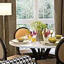 Un espace repas qui fait penser à celui d’une jolie table d’un restaurant parisien. Un espace repas qui fait penser à celui d’une jolie table d’un restaurant parisien.