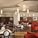 Dans le restaurant de la résidence de Villejuif, au plafond, des panneaux circulaires assurent l’isolation acoustique et participent au décor. Chaises à dossier en forme de médaillon, fauteuils enveloppants, on se croirait dans un restaurant chic et lounge du cœur de Paris. Dans le restaurant de la résidence de Villejuif, au plafond, des panneaux circulaires assurent l’isolation acoustique et participent au décor. Chaises à dossier en forme de médaillon, fauteuils enveloppants, on se croirait dans un restaurant chic et lounge du cœur de Paris.