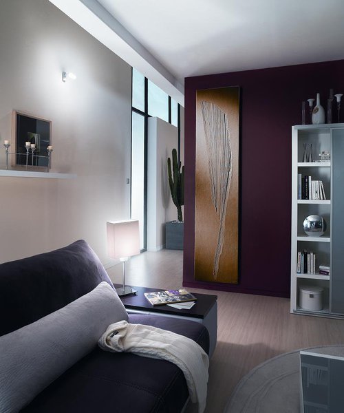 Le radiateur Oriental de Michel Cinier présente une surface sablée, disponible dans  les coloris ocre brun, gris quartz et ivoire.