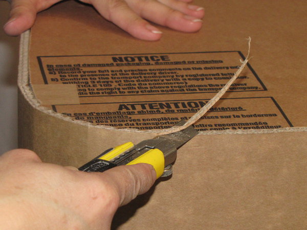 Etape 20. Découpez les éventuels dépassements de carton au cutter.