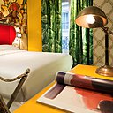 Atmosphère de terrasse coloniale dans la chambre "Océanie". Hôtel du Continent.