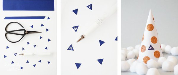 Découpez de petits triangles dans le papier bleu nuit pour confectionner les numéros ou utiliser des gommettes triangulaires.