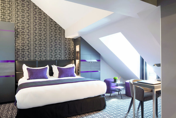 Ambiance des chambres  Grey Pourpre au mélange poudré de gris de lin et de gris tourterelle rehaussé d'un purple profond et chaleureux.