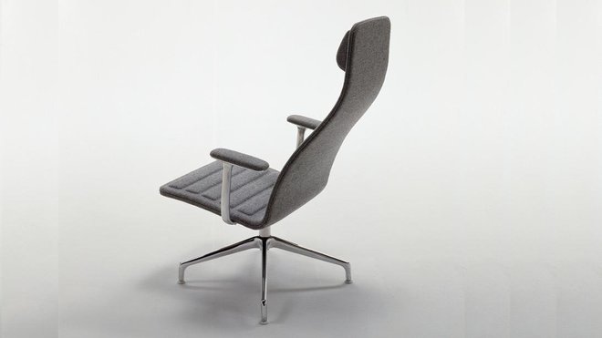 Siège de bureau au haut dossier ultra-confortable. Modèle Lotus Lounge Chair, édité par Vitra.