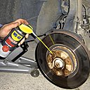 Un écrou de disque de frein récalcitrant pourra enfin de dévisser grâce au Super Dégrippant.