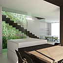 Dans le cœur de la maison, un patio agrémenté d’un mur végétal capture la lumière et l’oriente vers l’intérieur, oxygène et rafraîchit l'environnement.