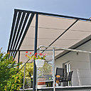 Double usage pour la pergola NEO qui associe la toile à des lames fixes.