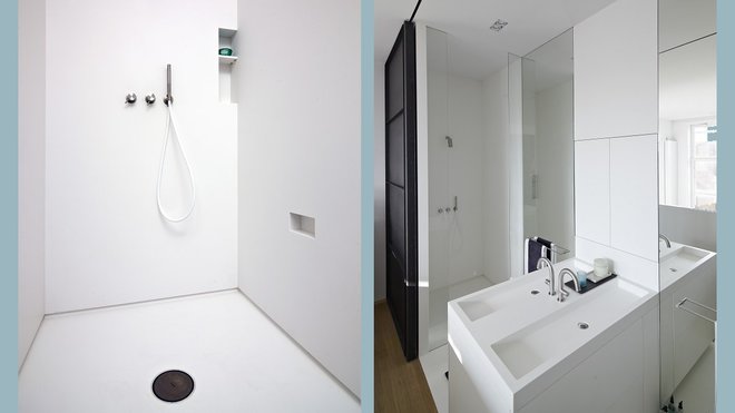 La salle de bains intégrée, située à l’arrière de la chambre, est entièrement constituée en HI-MACS® : le sol, les murs, mais aussi la douche et le lavabo sur mesure avec ses vasques personnalisées.
