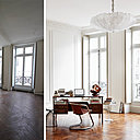 Une partie du salon est aménagé en bureau. Corniches et moulures habillent aussi l’espace. Un parquet Versailles réalisé avec du bois ancien de récupération remplace le motif à bâtons rompus.