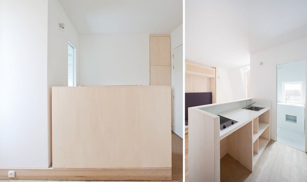 L’îlot technique de la cuisine a été intégré derrière un muret qui cache sa fonctionnalité, côté pièce à vivre.