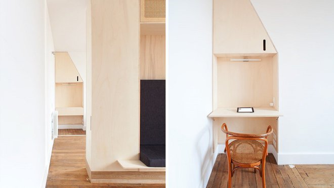 La communication entre la pièce à vivre et la chambre s’effectue par un espace libre. Un bureau a été aménagé dans un renfoncement de la chambre.