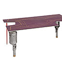 Déclinée dans une couleur lilas (tannage naturel), table basse Precious Catalyst avec pieds formés par des catalyseurs de voiture. Plateau recouvert de cuir pleine fleur avec un travail de dorure sur cuir. Le décor de galons classiques de bureau anglais a été réalisé par le gainier d’ameublement bruxellois Francis Dekelver, fournisseur agréé de la Cour de Belgique. Création Lionel Jadot. Déclinée dans une couleur lilas (tannage naturel), table basse Precious Catalyst avec pieds formés par des catalyseurs de voiture. Plateau recouvert de cuir pleine fleur avec un travail de dorure sur cuir. Le décor de galons classiques de bureau anglais a été réalisé par le gainier d’ameublement bruxellois Francis Dekelver, fournisseur agréé de la Cour de Belgique. Création Lionel Jadot.