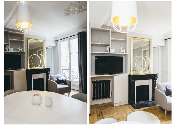 Dans la pièce à vivre on a conservé la cheminée qui s’intègre dans l’espace. La télévision a été intégrée dans la bibliothèque. Fauteuil Jimi, La Redoute. Lampe à poser circulaire, création Jean-Luc Le Deun.