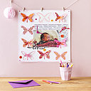 Léna est née, une page de scrap aux papillons découpées marque la bonne nouvelle !