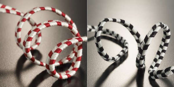 Black and white. Un modèle d’embrasse classique, tissé et fabriqué dans un jeu de fils noir et blanc. Dedar.