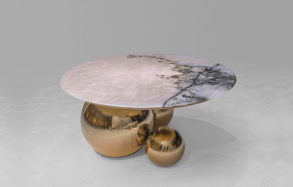 Cette collection de mobilier, de luminaires et de bijoux dont le nom Jinshi signifie « Pierre d'Or », inscrit en son cœur, le jade rose, gemme naturel exceptionnel d’une transparence poudreuse somptueuse. Jinshi fait dialoguer les cultures occidentales et orientales, aussi bien en architecture qu’en design, la signature du studio de création. Table basse Jinshi, création Studio MVW 2017, jade rose, inox anodisé laiton, édition limitée de 8 + 4 EA, Galerie BSL.