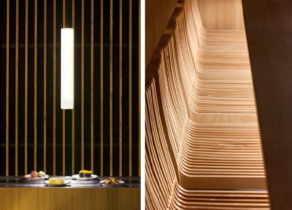 Les lames de bois des murs répondent à celles qui composent les sièges.