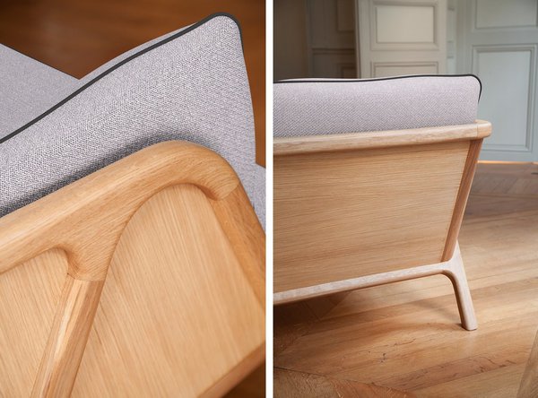 Détails sur le canapé Echo habillé de bois et travaillé sur toutes ses faces pour être beau sous tous les points de vue. Sa structure à l’extérieur, à l’image du bandeau de bois qui en souligne ses contours, permet de le placer n’importe où. Ses pieds en forme de compas soutiennent la pièce et participent à son dessin général.