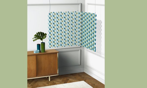 Posé à la verticale, sa souplesse lui permet de s’adapter aux contraintes domestiques, en angle dans une pièce ou dans une montée d’escalier... Radiateur tressé, création Romain Pin.