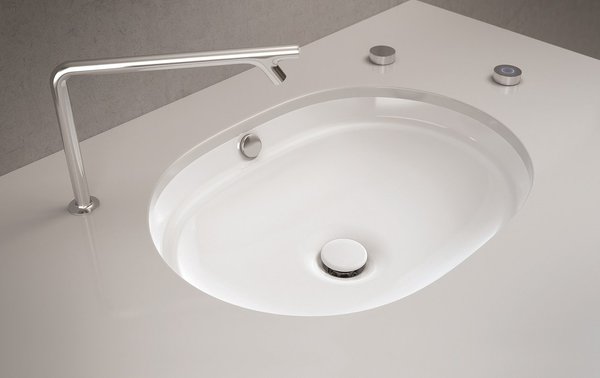 Métropole de Vitra est un lavabo qui se nettoie grâce à un système de cartouche et de détergent intégré à la vasque et combiné à un détecteur, déclenchant le rinçage.