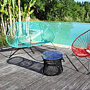 Loveuse Acapulco, en acier époxy et cordage plastique PVC haute résistance à mémoire de forme. Traité anti-UV et anti-oxydation, 100% recyclable ( H 100 x L 121 cm). Structure noire ou blanche, 499 € ou 579 €.