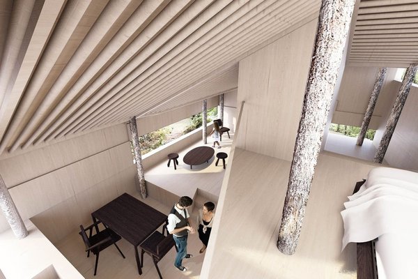 A l’intérieur, l’aménagement composé de meubles aux lignes simples et formes essentielles contraste avec l’esprit rustique des poteaux, véritables troncs bruts d’arbres qui percent les planchers. Le mobilier aux teintes sombres se démarque de l’enveloppe interne en bois clair.