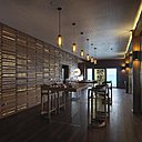 Les tables conviviales sont le point fort de l’espace habillé de bois et souvent travaillé en claustra ajouré pour conférer une certaine transparence et légèreté à l’espace.