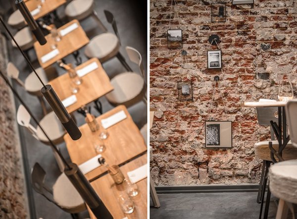 Les suspensions ont été créées en exclusivité pour le restaurant ; le mur en brique est ponctué de photos noir et blanc en référence au restaurant l’Air du temps.