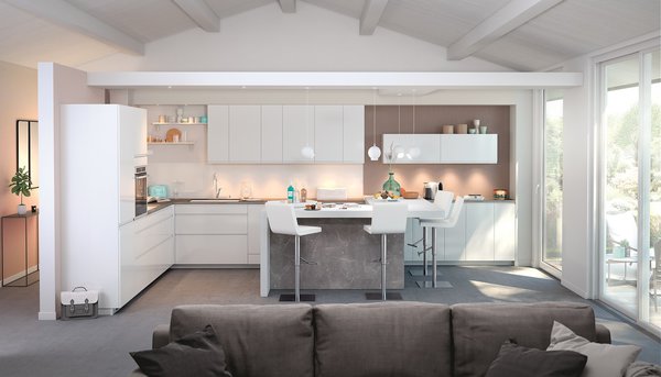 De larges tiroirs et des poignées encastrées dans la façade caractérisent cette cuisine résolument contemporaine.