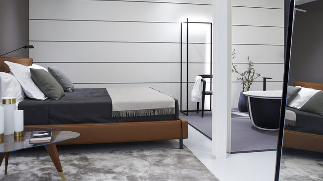 Chaque pièce est recomposée pour offrir une offre globale. Ici, l’espace chambre, aménagé comme une suite d’hôtel avec sa salle de bains et sa baignoire en îlot.