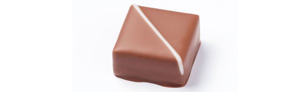 Jasmin-fruité : ganache lait à l’infusion de jasmin sur gelée de mangue vanillée.