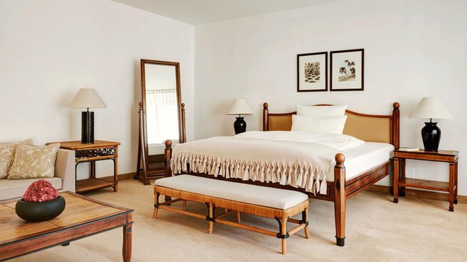 Chambre épurée avec son mobilier classique et sobre