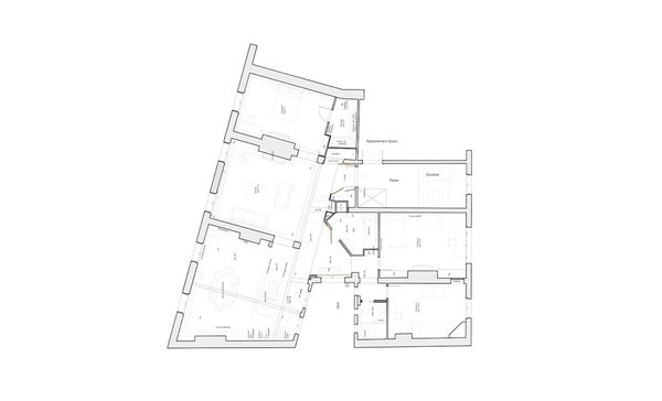 Dans cet appartement T5 (3 chambres, un salon, une salle à manger), on a créé une cuisine ouverte sur la salle à manger et des niches de circulation qui viennent séparer les pièces à vivre des pièces de nuit.